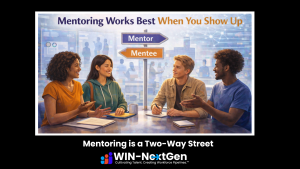 Mentors and mentees sitting at round table in discussion